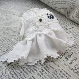 Embroidered bracelet, Tattered textile, Cuff bracelet Textile, Fabric  bracelet, white bracelet, bracelet with buttons, sewn by hand