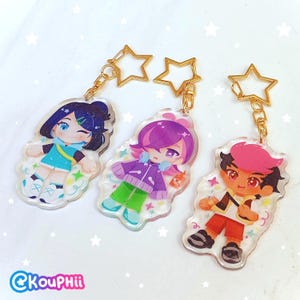 Pkmn Horizons: Mega Voltage Epoxy Glitter Keychains (Liko, Dot, Roy)