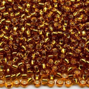 10/0 17070 Preciosa Seed Beads rocailles. Yellow Brown transparent Silver lined. Czech glass seed beads.