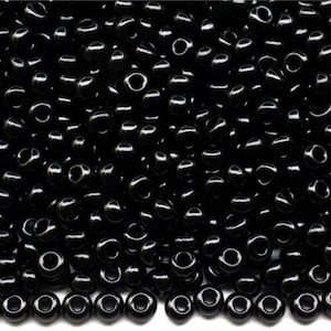 10/0 23980 Preciosa Czech Glass Seed Beads Rocailles 2.3mm. Opaque black.