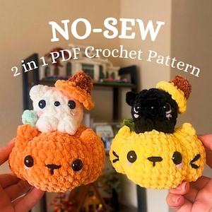 May include: Two crocheted plush toys: a white bear and a black cat, each atop a pumpkin. The pumpkins are orange and yellow, with black eyes and a stitched mouth. The text "NO-SEW 2 in 1 PDF Crochet Pattern" is displayed above.