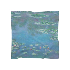 May include: A square scarf featuring a watercolor painting of water lilies in a pond. The artwork showcases a palette of blues, greens, and pinks, with soft brushstrokes creating a dreamy, impressionistic effect. The scarf is a wearable art piece.