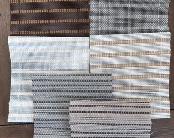 May include: Natural Woven Shades in various colors and patterns, including brown, gray, beige, and white.