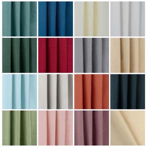 May include: A collection of fabric swatches in various colors, including teal, navy, cream, and white. Other colors include dark green, red, gray, and tan. Additional swatches are light blue, light gray, orange, and dark blue. The bottom row features green, pink, purple, and beige.