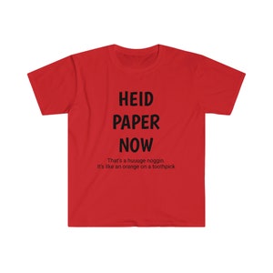 May include: A red t-shirt with the words "HEID PAPER NOW" in black, along with the phrase "That's a huuuge noggin. It's like an orange on a toothpick." This graphic tee is a humorous statement piece.