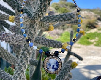 Blue necklace made of natural hematite and sodalite stones