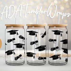 May include: Three clear glass tumblers with black graduation caps and diplomas printed on them. The tumblers have bamboo lids and straws. The text "ADA Tumbler Wraps" is at the top of the image. The text "PNG & SVG" is in a brown rectangle at the bottom left of the image.