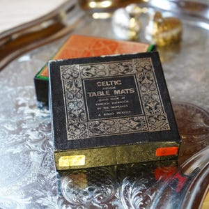 Vintage Celtic Table Mats Coasters Scotland &quot;The four men of kells&quot; Gold On Red NIB/ Gift for a Viking warrior man