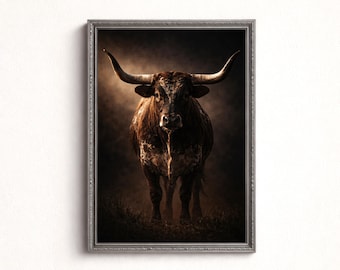 May include: Framed print of a longhorn bull. The bull has a brown and white coat, large curved horns, and is facing forward. The artwork is set against a dark, smoky background, and framed in a silver-colored frame.