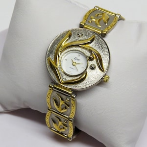 Linél Quartz Wristwatch 8” Panel Bracelet Band Floral Gold and Silver Tone Vintage Analog Cool and Unique