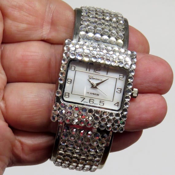 Geneva Platinum Cuff Bracelet 7 1/2” Ladies Watch Bejeweled  display picture 1
