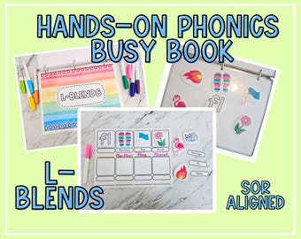 Può includere: Un libro di attività fonetiche Hands-On Phonics per i gruppi consonantici con L, con pagine educative colorate, pennarelli e immagini ritagliate di fiamma, infradito, bandiera, fiore, fenicottero, mosca, e il testo L-BLENDS e SOR ALIGNED.