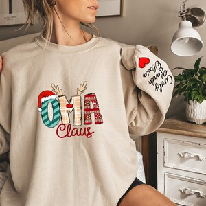 Custom Oma Claus Sweatshirt & Hoodie, Christmas Grandma Sweatshirt, Gift for Mom, Custom Mama Sweatshirt with Children Name on Sleeve