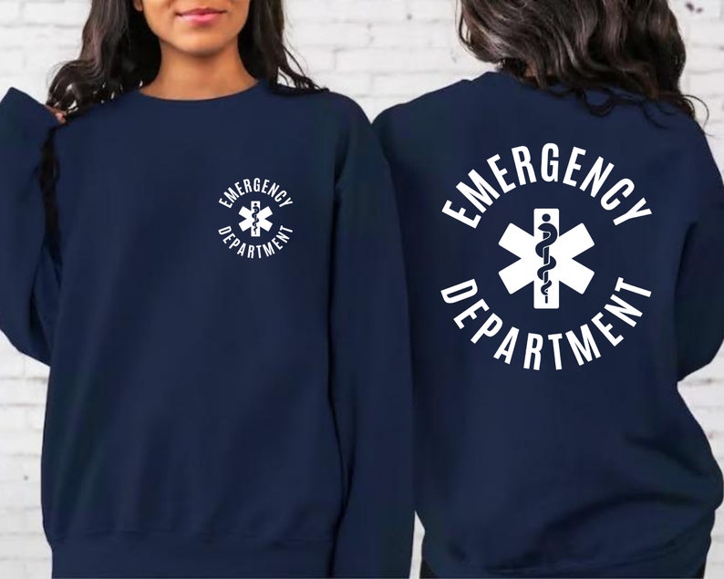 May include: Navy blue sweatshirt with white text that reads "Emergency Department" and a white medical symbol with a snake.