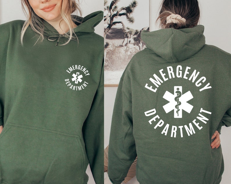 May include: A green hooded sweatshirt with a white graphic of a medical symbol and the text "Emergency Department".