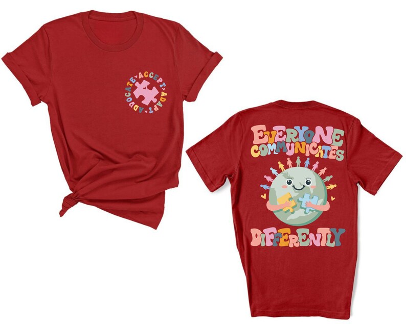 May include: Two red t-shirts with a graphic design. The front shirt has a puzzle piece with the text "Advocate, Accept, Adapt". The back shirt has a cartoon earth holding a puzzle piece with the text "Everyone Communicates Differently".