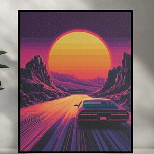 May include: A retro-style illustration of a car driving on a road with a large, orange sun in the background. The car is a dark red color and has a black interior. The road is a light purple color and is surrounded by mountains. The sun is a bright orange color and is surrounded by a light blue sky.