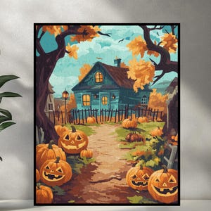 May include: A framed Halloween-themed jigsaw puzzle. The image depicts a teal house with jack-o'-lanterns lining a path. The scene is set in autumn with orange and yellow foliage, a wooden fence, and a blue sky. The puzzle is displayed on a white shelf.