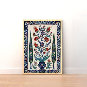 May include: A rectangular wall art print featuring a central vase filled with red tulips and carnations, flanked by two tall green cypress trees. The design is enclosed in a decorative blue and white floral border on a cream-colored background.