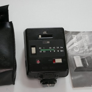 Canon Speedlite 188A Shoe Mount Flash for Canon A Series Film Cameras from Japan Includes Original Case and Instruction Booklet