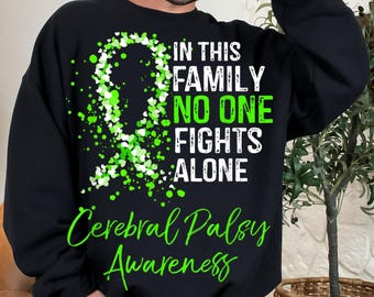 May include: Black sweatshirt with the text "IN THIS FAMILY NO ONE FIGHTS ALONE" in white and green. A green ribbon design is on the left side. The words "Cerebral Palsy Awareness" are written in green script at the bottom.