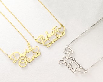 May include: Three gold and silver necklaces with cursive names and a heart charm. The necklaces feature the names "David Olivia", "Robert Sandra", and "Romeo Juliet".