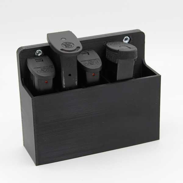 Magnetic pistol magazine rack