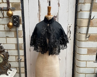Antique French handmade black silk beaded short cape with lace trim