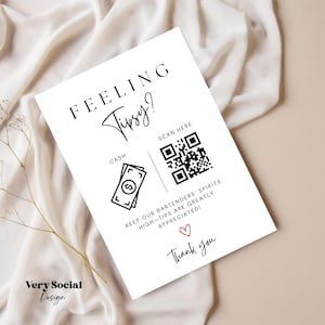 May include: A white sign with black text that reads "Feeling Tipsy?" with a cash icon and a QR code. The text below the QR code reads "Keep our bartenders' spirits high - tips are greatly appreciated!" and "Thank you".