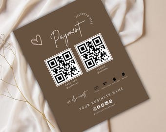 May include: A brown sign with the text "ACCEPTED HERE" and "Payment" in white cursive. The sign includes two QR codes, one for Cash App and one for Venmo, with the usernames below. The sign also lists other payment methods accepted, including cash, credit card, Apple Pay, and PayPal. The text "we also accept" is written in white cursive. The sign also includes the text "YOUR BUSINESS NAME" in white cursive, followed by social media icons for Instagram, Facebook, and Twitter. The text "@YOURSOCIALHANDLE" is written in white cursive below the social media icons.