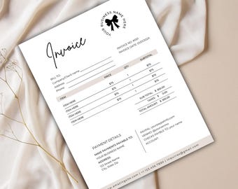 May include: A white invoice with a black bow logo and the words "Invoice" in elegant script. The document includes fields for billing details, item descriptions, and payment information. The total amount is $300.00.