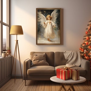May include: A framed painting depicting a young angel with wings, wearing a white dress and holding a sprig of holly. The angel is standing in a snowy landscape with stars in the background.