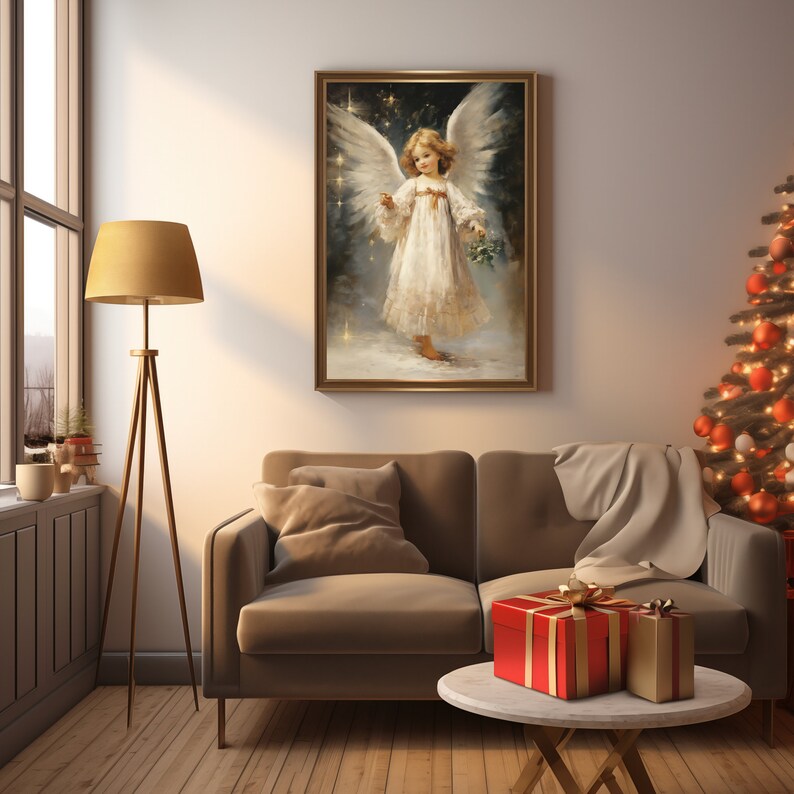 May include: A framed painting depicting a young angel with wings, wearing a white dress and holding a sprig of holly. The angel is standing in a snowy landscape with stars in the background.