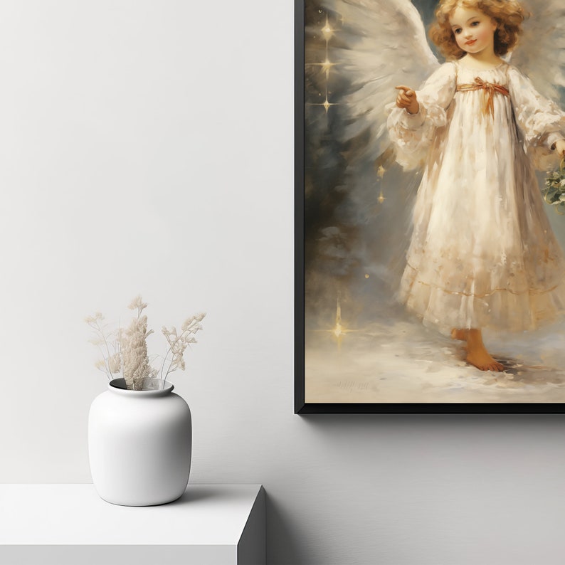 May include: A framed painting of an angel with wings, wearing a white dress and holding a sprig of holly. The angel is standing in a snowy landscape with stars in the background.