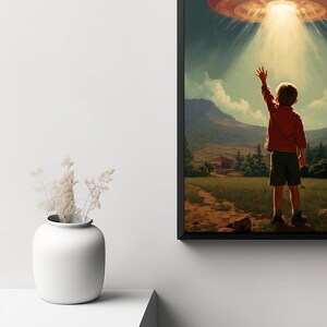 K&ouml;nnte beinhalten: Eine gerahmte Illustration eines Kindes, das die Hand zu einer fliegenden Untertasse am Himmel ausstreckt. Das Kind tr&auml;gt ein rotes Hemd und blaue Shorts. Der Hintergrund ist ein gr&uuml;nes Feld mit einem kleinen Haus in der Ferne.