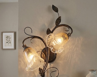 Handcrafted 2-light wall sconce in wrought iron and glass, Cox collection.