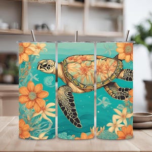 Puede incluir: Tres vasos de acero inoxidable con un diseño de una tortuga marina nadando en un océano turquesa con flores naranjas y amarillas.