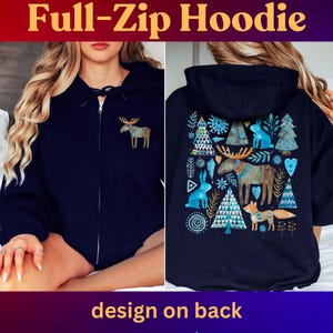 May include: Navy blue full-zip hoodie with a front moose graphic and a back design featuring a moose, fox, rabbits, and trees. The text "Full-Zip Hoodie" is at the top, and "design on back" is at the bottom.