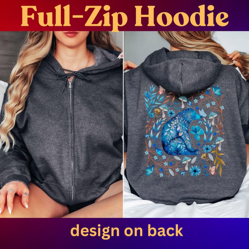 May include: Charcoal gray full-zip hoodie with a blue floral bear design on the back. The hoodie features a front zipper and a hood. The text "Full-Zip Hoodie" is at the top, and "design on back" is at the bottom.