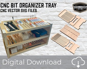 May include: A wooden CNC bit organizer tray with multiple shelves, filled with various tools and bits. The text "CNC BIT ORGANIZER TRAY" and "CNC VECTOR SVG FILES" is displayed at the top. The words "Digital Download" are at the bottom. A logo for McGill & Sons is in the upper right corner.