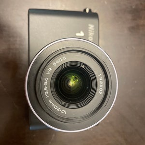 Nikon 1 J1 10.1MP Digital Mirrorless Camera - Black W/10-30mm 1:3.5-5.6 VR Lens (SC of 1803)
