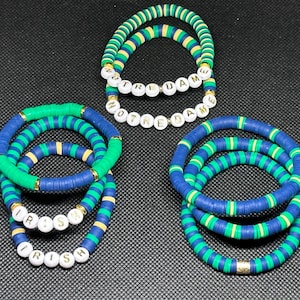 Pulseras de día de juego de Notre Dame