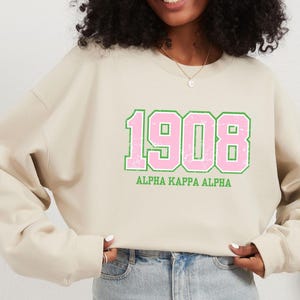 1908 Alpha Kappa Alpha Sweatshirt mit Rundhalsausschnitt