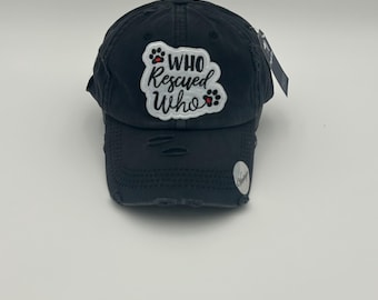Who rescued who animal lover black pony tail distressed hat