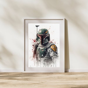 May include: A white framed print of a watercolor painting of Boba Fett, a fictional bounty hunter from the Star Wars universe. The painting features a green and brown helmet with a red visor, a yellow shoulder pad, and a blaster rifle. The background is white with red and orange splatters of paint.