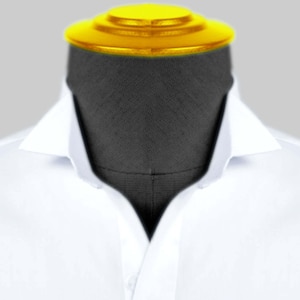 May include: A white dress shirt with a pointed collar. The shirt is on a mannequin with a black fabric head and a yellow top.