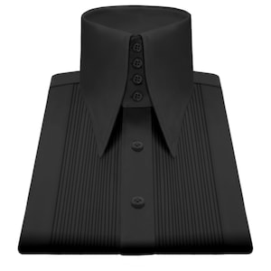 May include: A black dress shirt with a high, pointed collar and vertical pleats on the front. The shirt has four buttons on the collar and two buttons down the front. The shirt is folded neatly.