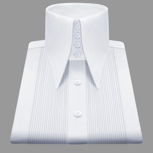 May include: A pristine white dress shirt with a high, pointed collar and vertical pleats. The shirt has four buttons on the collar and two down the front, giving a formal and elegant appearance. The shirt is neatly folded, ready to wear.