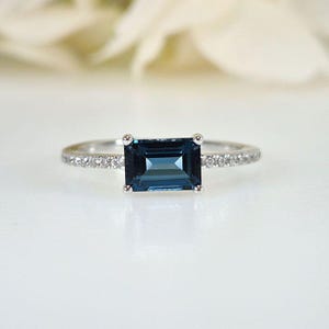 Swiss Blue Topaz & Moissanite Ring: Sterling Silver Engagement Ring