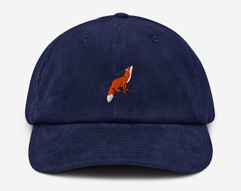 May include: A navy blue corduroy baseball cap with an embroidered orange fox design.